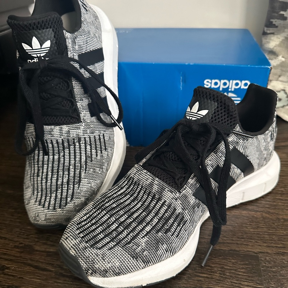 Men’s Adidas athletic shoes. Size 8.5. Worn a couple times, look new